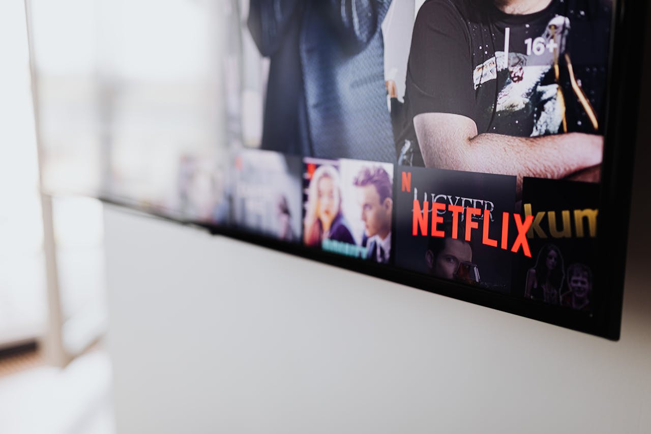journey Selective focus of a Netflix screen on a smart TV in an indoor setting.